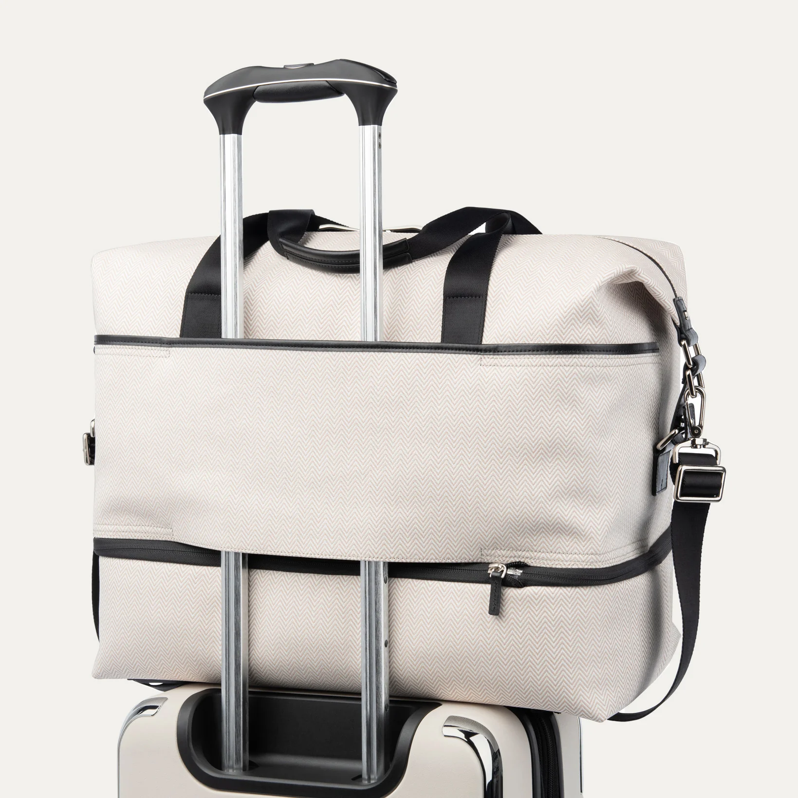 Travelpro® x Travel + Leisure Medium Check-in Spinner and Drop-Bottom Weekender Bag Luggage Set - Image 11