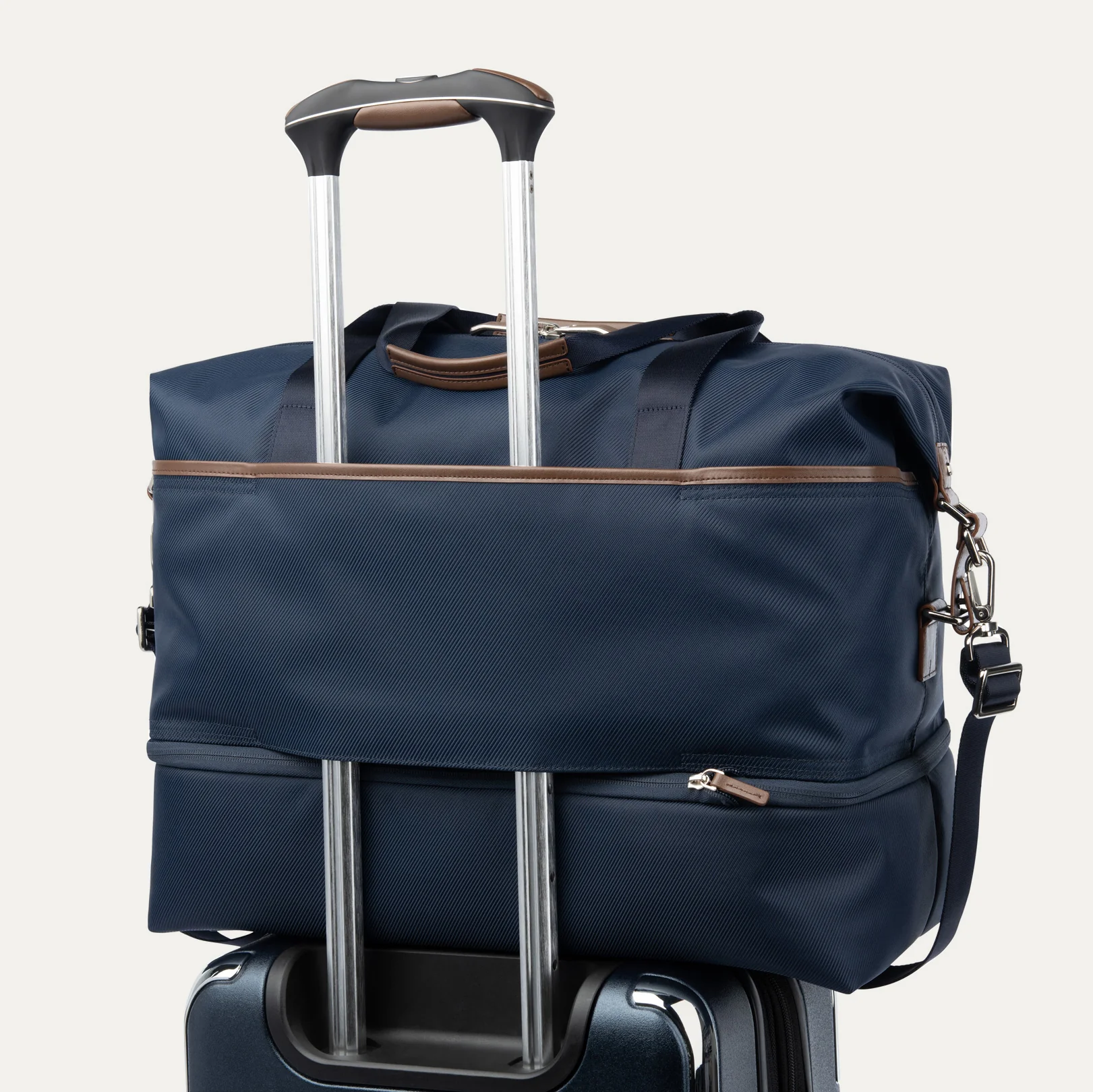Travelpro® x Travel + Leisure Medium Check-in Spinner and Drop-Bottom Weekender Bag Luggage Set - Image 4